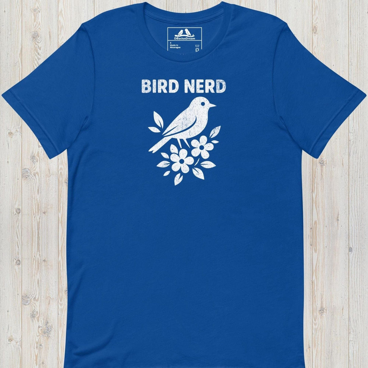 Blue vintage bird nerd t-shirt featuring a simple white bird graphic and Bird Nerd text