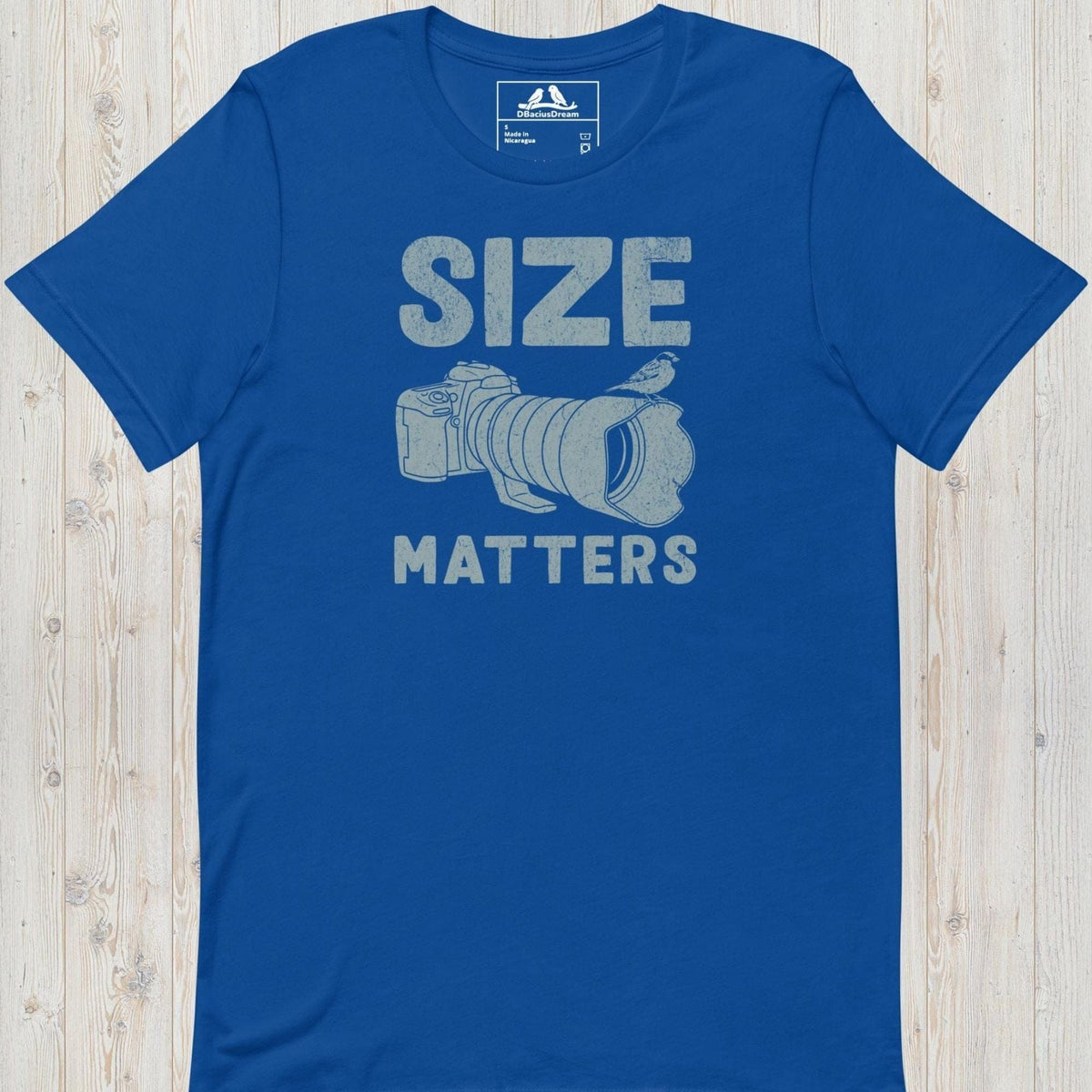 Blue funny bird photography t-shirt with DSLR camera, large telephoto lens, perched bird, and funny "Size Matters" quote