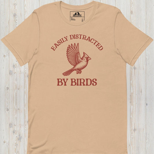 Beige Easily Distracted By Birds T-Shirt with vintage flying bird graphic and text design