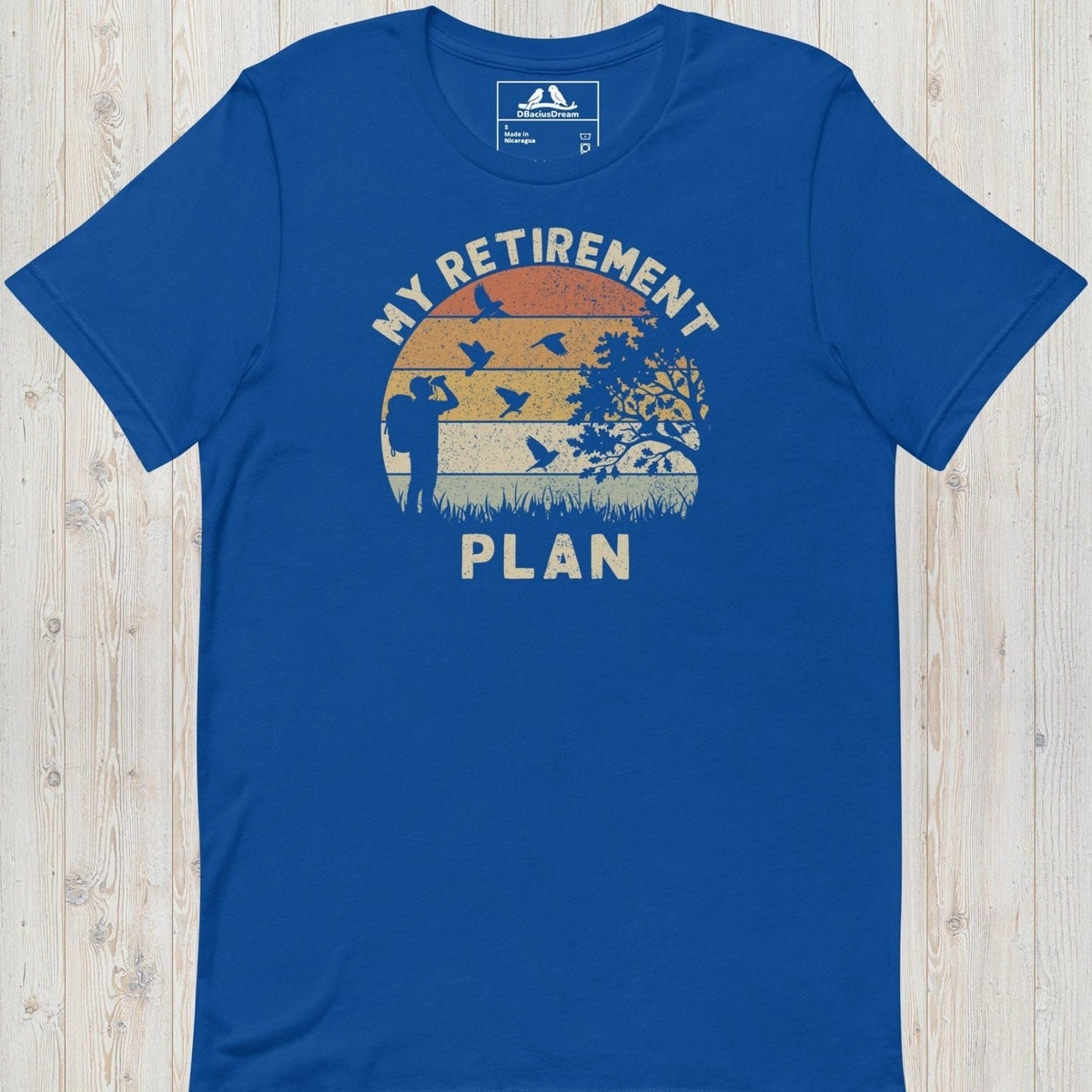Blue birding my retirement plan t-shirt with a vintage sunset graphic, a birder, and flying birds
