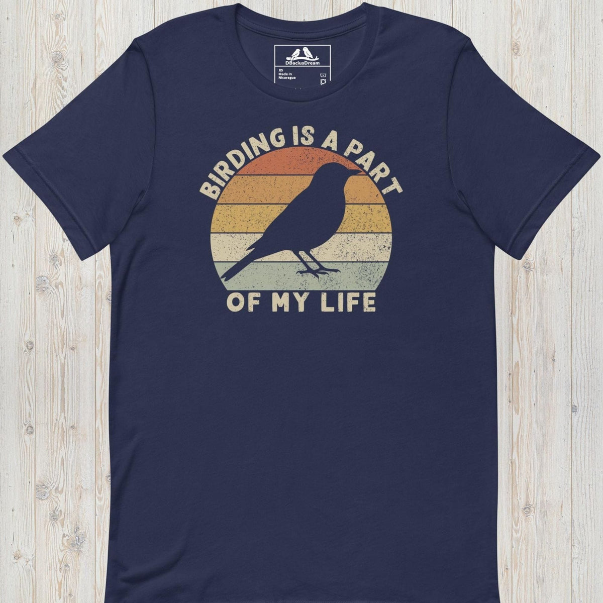 Dark Blue bird lover t-shirt with a vintage sunset graphic, bird silhouette and the quote "Birding Is A Part Of My Life"