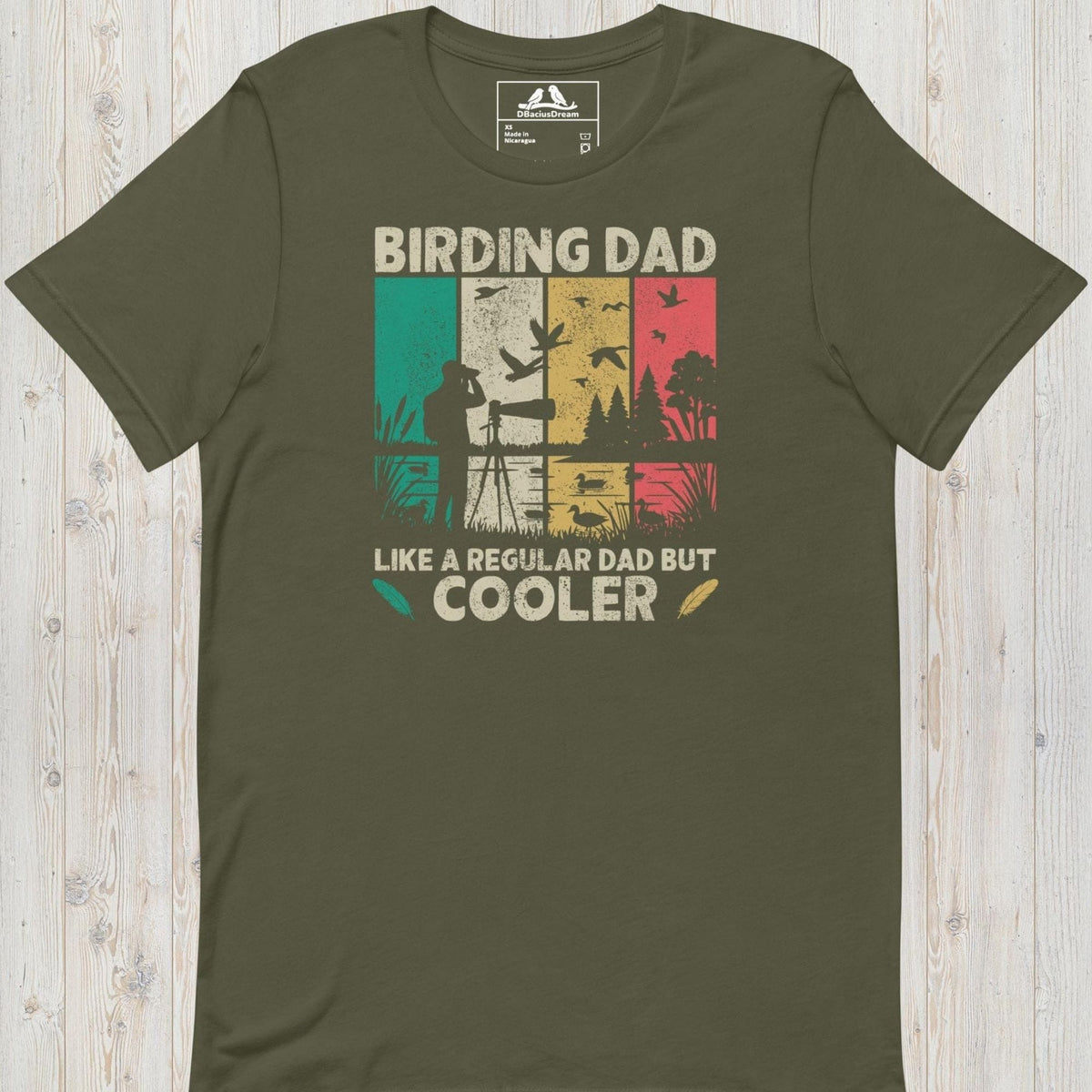 Olive green birding dad t-shirt featuring a vintage birdwatching graphic and the quote "Birding Dad Like a Regular Dad But Cooler"