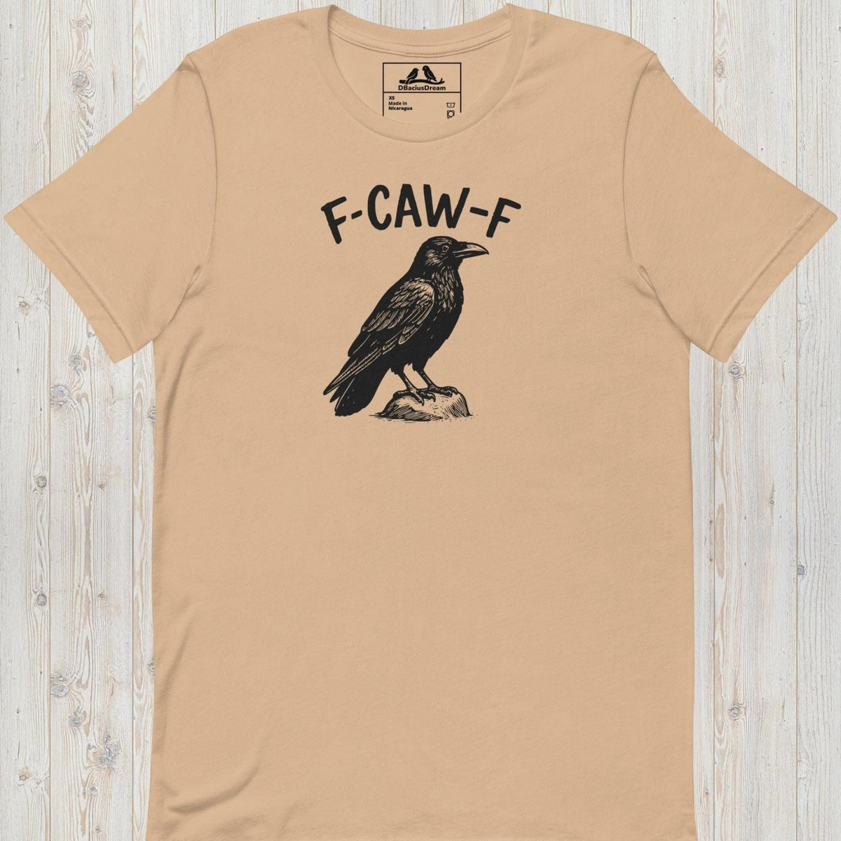 Beige funny crow t-shirt with a crow graphic and the humorous quote "F-Caw-F"
