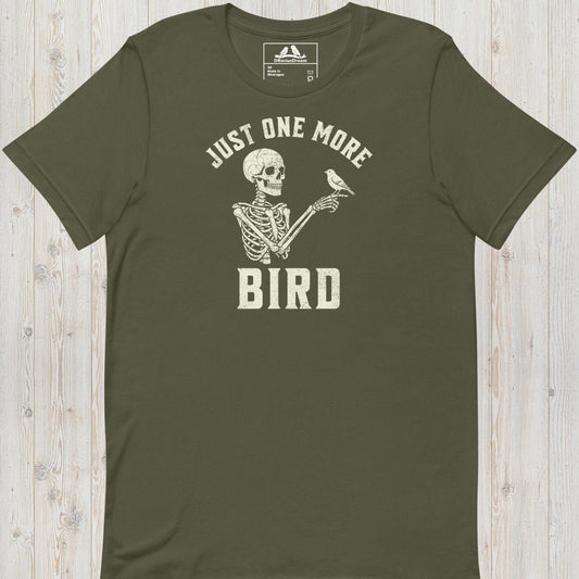 Olive green just one more bird t-shirt with a skeleton birder graphic and the quote "Just One More Bird"