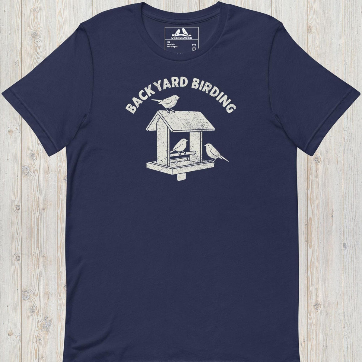 Dark blue backyard birding t-shirt with a bird feeder graphic and birds