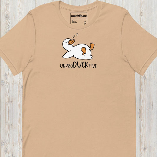 Beige funny duck t-shirt featuring a lazy duck lying on its back and the text "UnproDUCKtive"