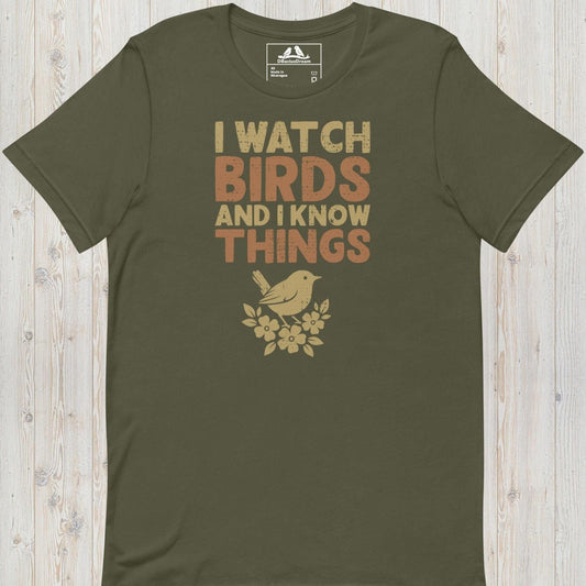 Olive green I watch birds and I know things t-shirt with a bird graphic and floral elements