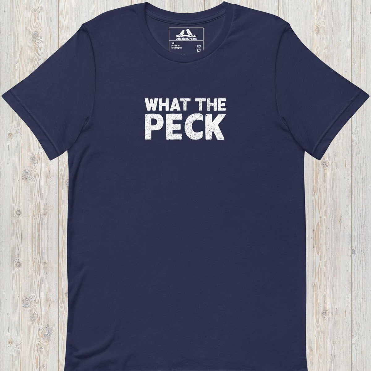 Dark blue bird pun t-shirt with "What The Peck" funny quote text design