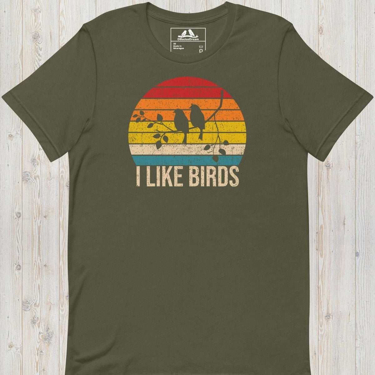 Olive Green I Like Birds graphic t-shirt with sunset bird silhouette design