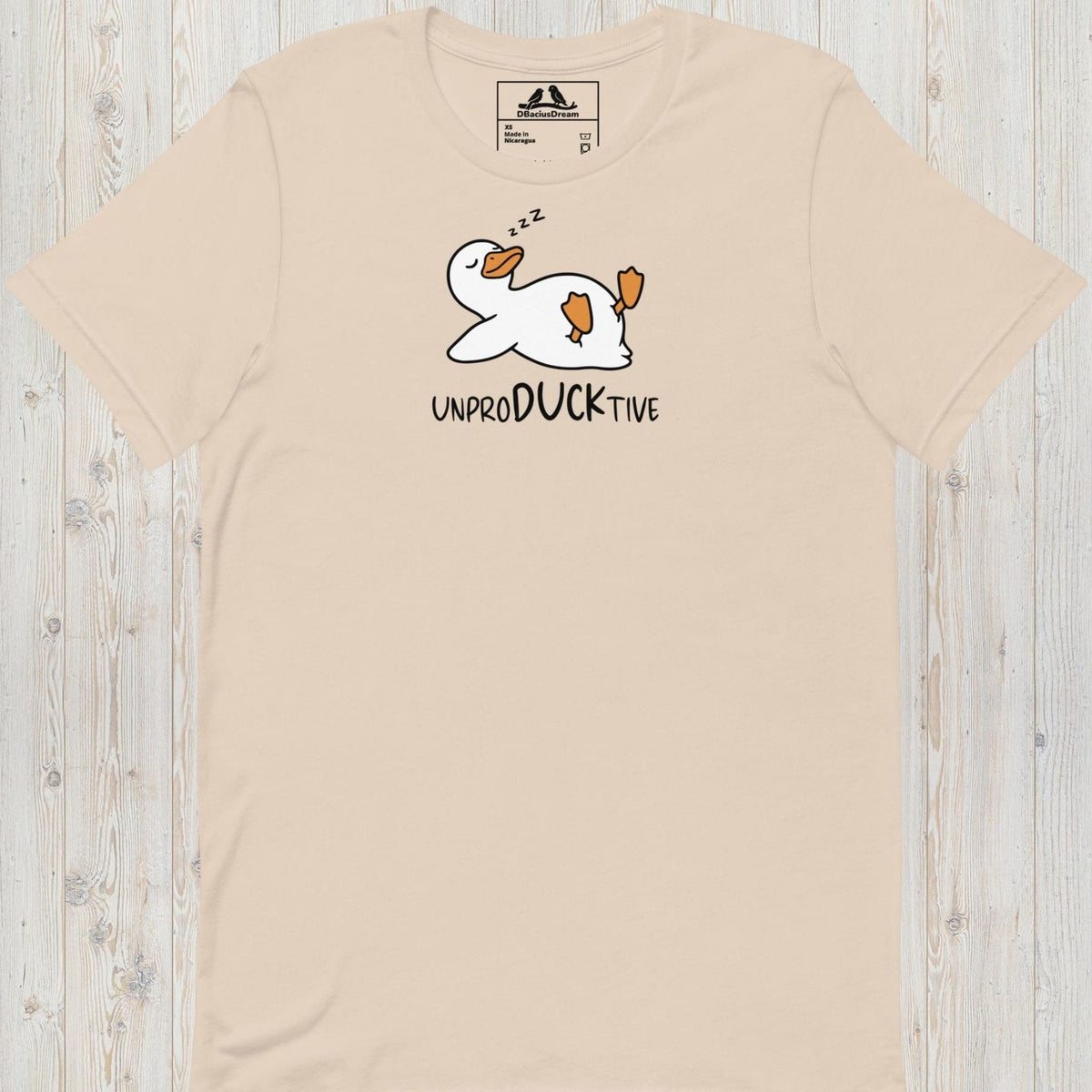 Light Beige funny duck t-shirt featuring a lazy duck lying on its back and the text "UnproDUCKtive"