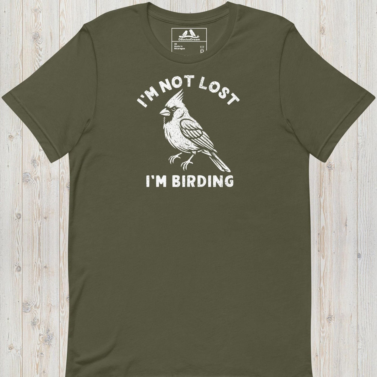 Olive green funny birding t-shirt featuring a northern cardinal and "I'm Not Lost I'm Birding" text