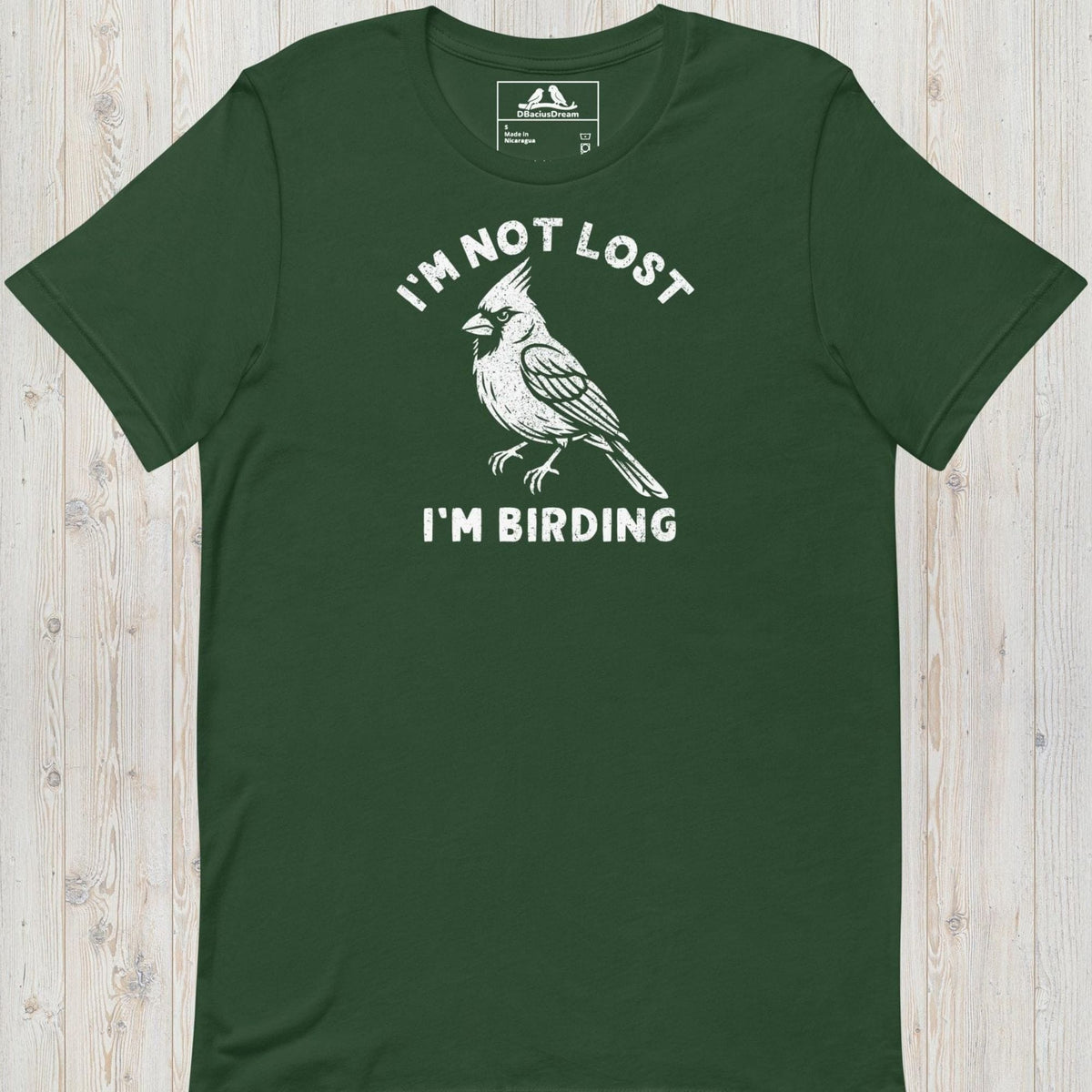 Green funny birding t-shirt featuring a northern cardinal and "I'm Not Lost I'm Birding" text