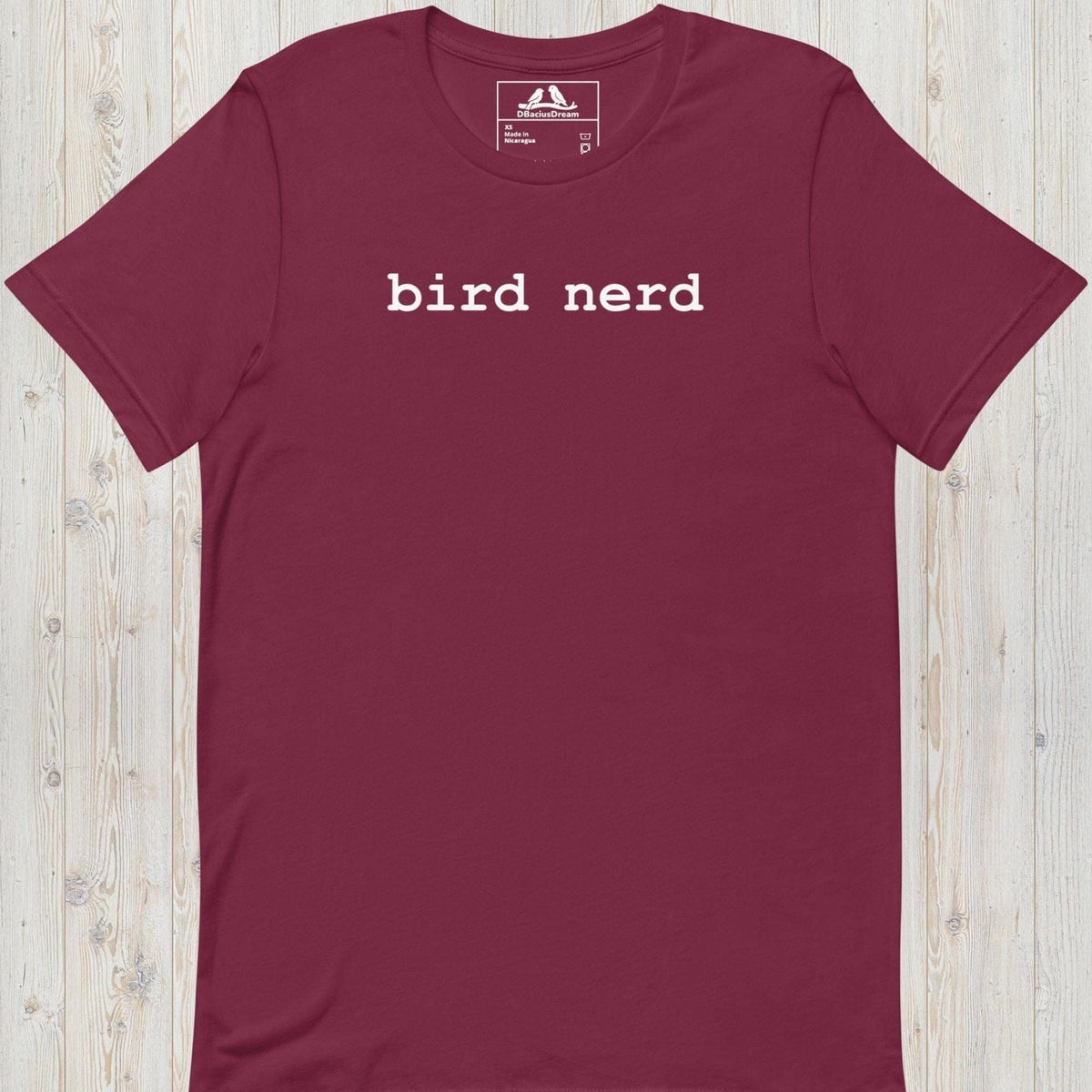 Maroon minimalistic bird nerd t-shirt with simple white bird nerd text design