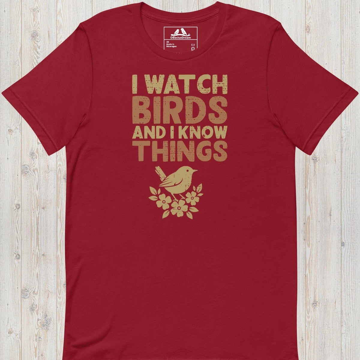 Red I watch birds and I know things t-shirt with a bird graphic and floral elements