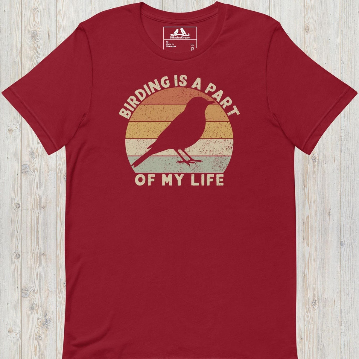 Red bird lover t-shirt with a vintage sunset graphic, bird silhouette and the quote "Birding Is A Part Of My Life"