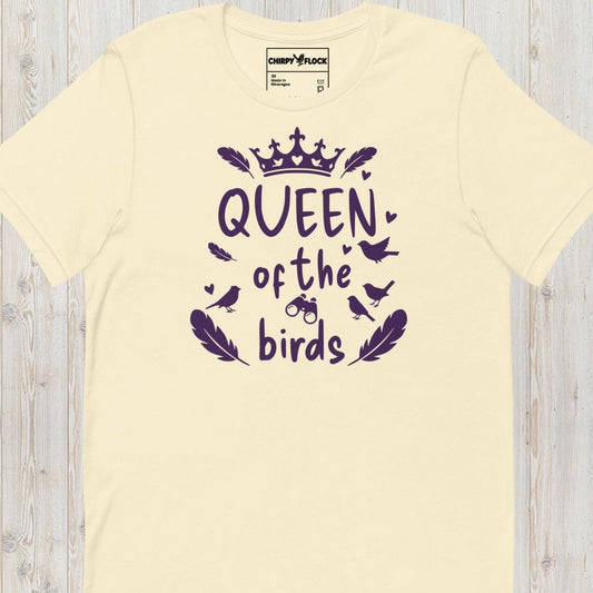 Cream queen of the birds t-shirt with a purple bird graphic, crown design and decorative bird silhouettes