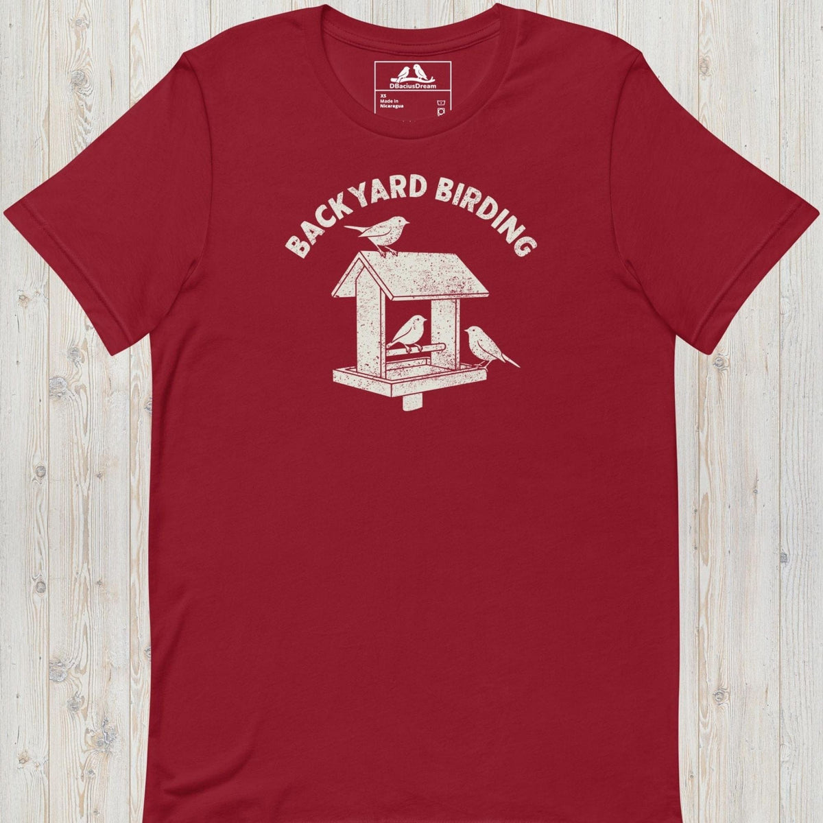 Red backyard birding t-shirt with a bird feeder graphic and birds