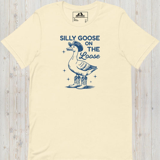 Cream silly goose on the loose t-shirt with a playful goose illustration and the humorous quote "Silly Goose On The Loose"