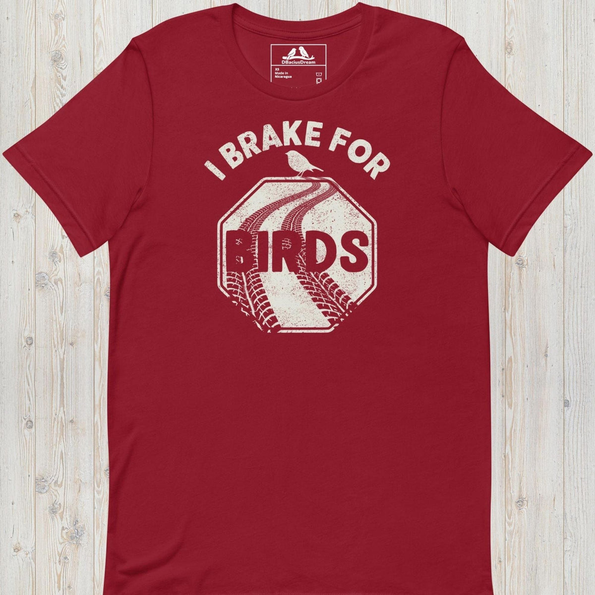 Red I brake for birds t-shirt featuring a distressed road sign graphic