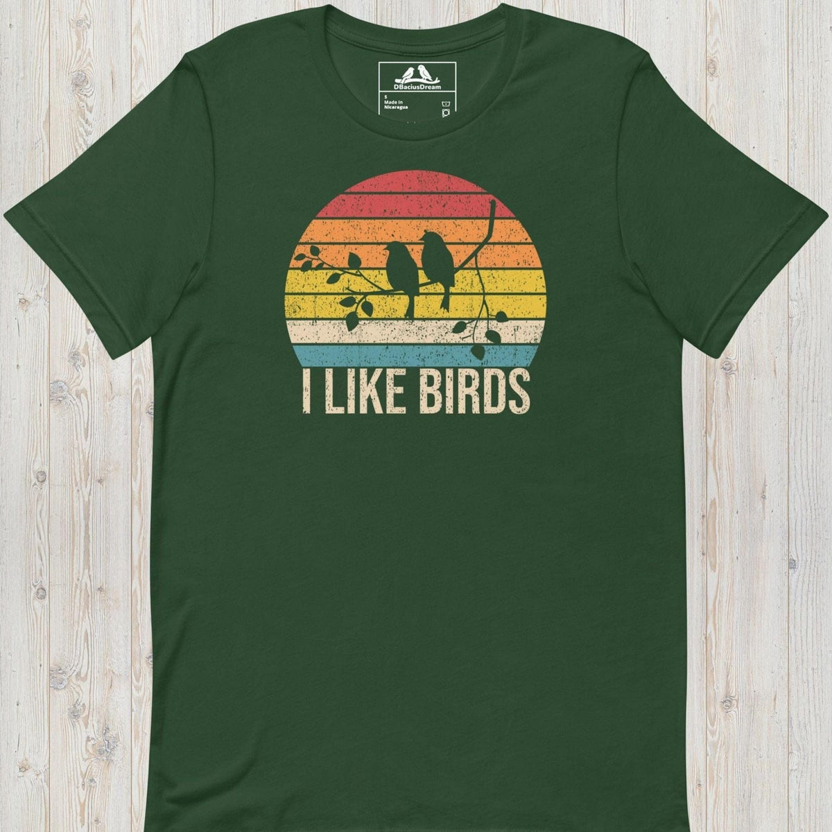 Green I Like Birds graphic t-shirt with sunset bird silhouette design