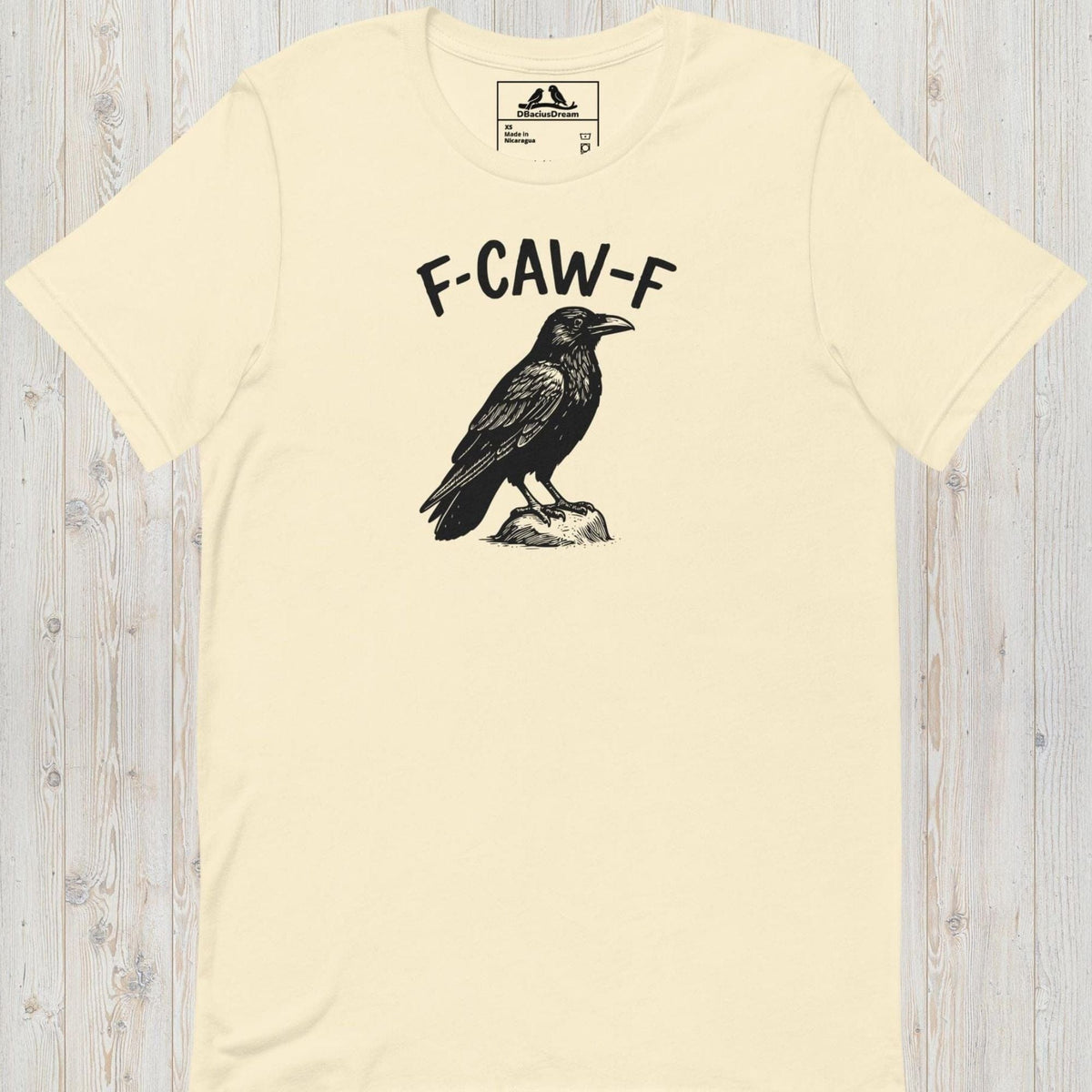 Cream funny crow t-shirt with a crow graphic and the humorous quote "F-Caw-F"