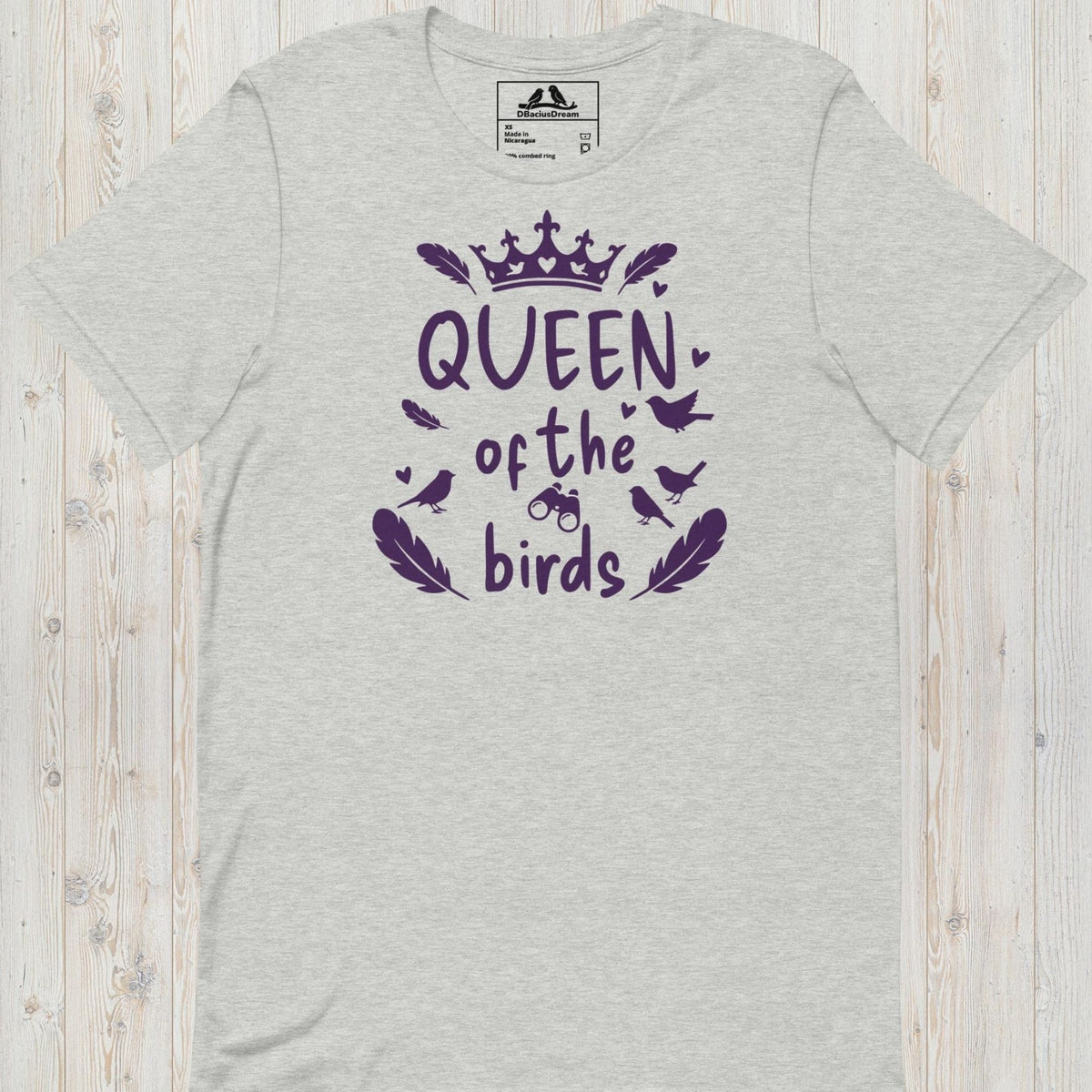 Gray queen of the birds t-shirt with a purple bird graphic, crown design and decorative bird silhouettes